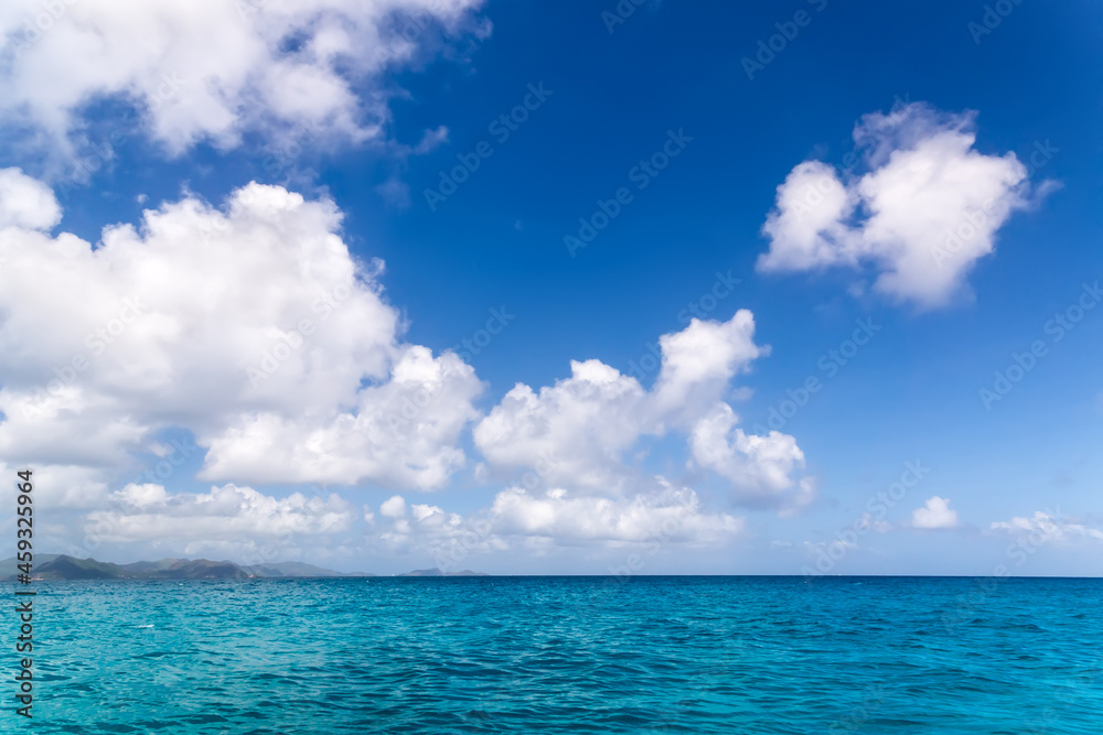 Seascape Sunny day. Blue sky and blue water.