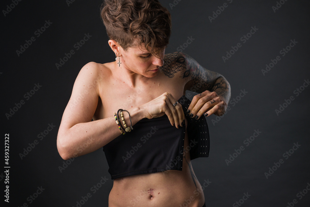 Transgender non-binary tomboy wearing Binder bra for aesthetic. Small breast  Self identity problem Stock Photo