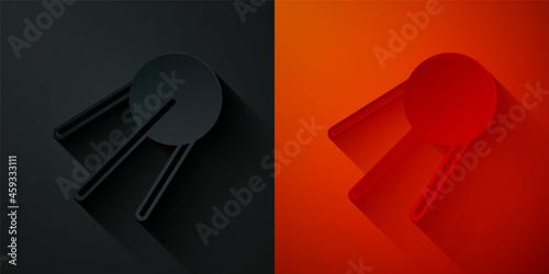 Paper cut Satellite icon isolated on black and red background. Paper art style. Vector