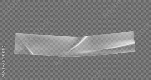 Transparent glued adhesive tape piece with curled corners. Blank adhesive paper or plastic label