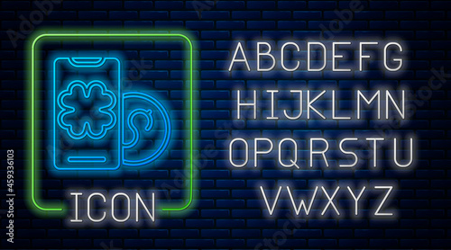 Glowing neon Online poker table game icon isolated on brick wall background. Online casino. Neon light alphabet. Vector
