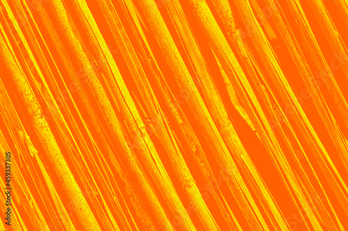 Orange background or texture with bamboo