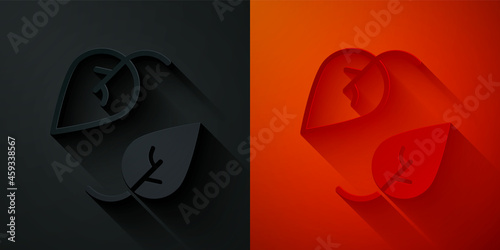 Paper cut Leaf icon isolated on black and red background. Leaves sign. Fresh natural product symbol. Paper art style. Vector