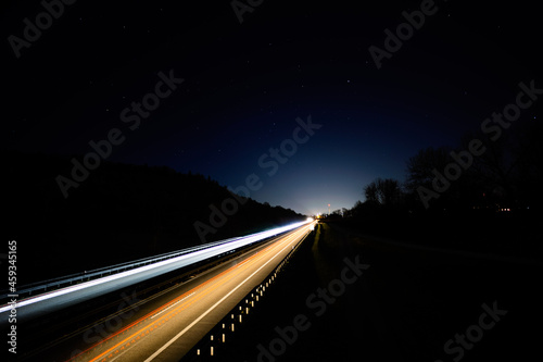 car driving on highway at night