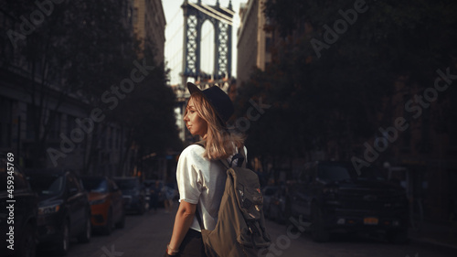Pretty Woman at The Brooklyn Bridge in New York City at Sunrise