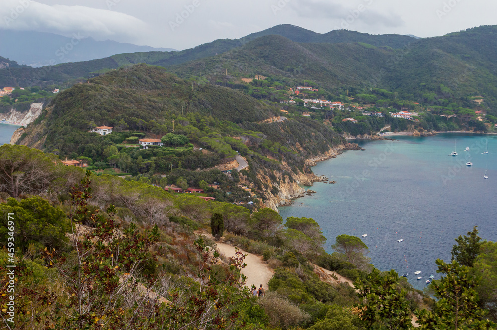 Western part of the little peninsula of Monte Enfola in Elba island in Italy with its nice big open bay 