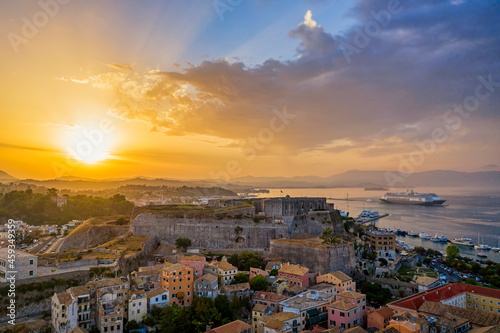 Aerial drone view of Kerkyra with new Fortress and port during amazing sunset. Corfu island, Greece.