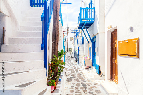 Famous old town narrow street with white houses. Mykonos island, Greece © Nikolay N. Antonov