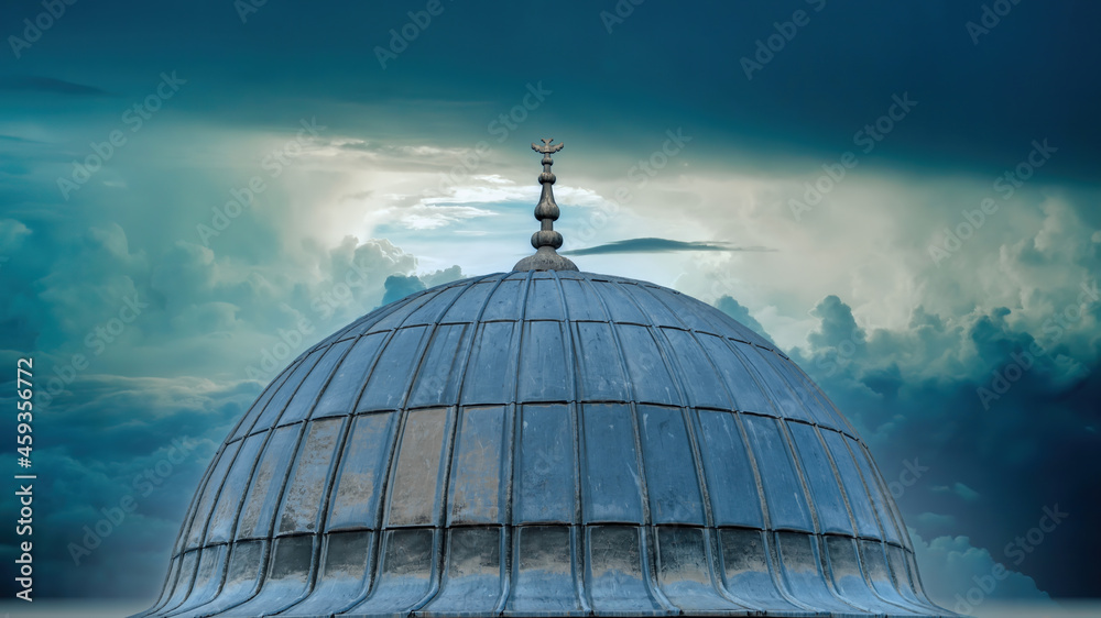 Istanbul, Turkey - September 2021: Dome of Suleymaniye Mosque with dramatic sunset, Eminonu, Istanbul, Turkey 