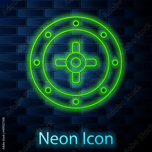 Glowing neon line Safe icon isolated on brick wall background. The door safe a bank vault with a combination lock. Reliable Data Protection. Vector