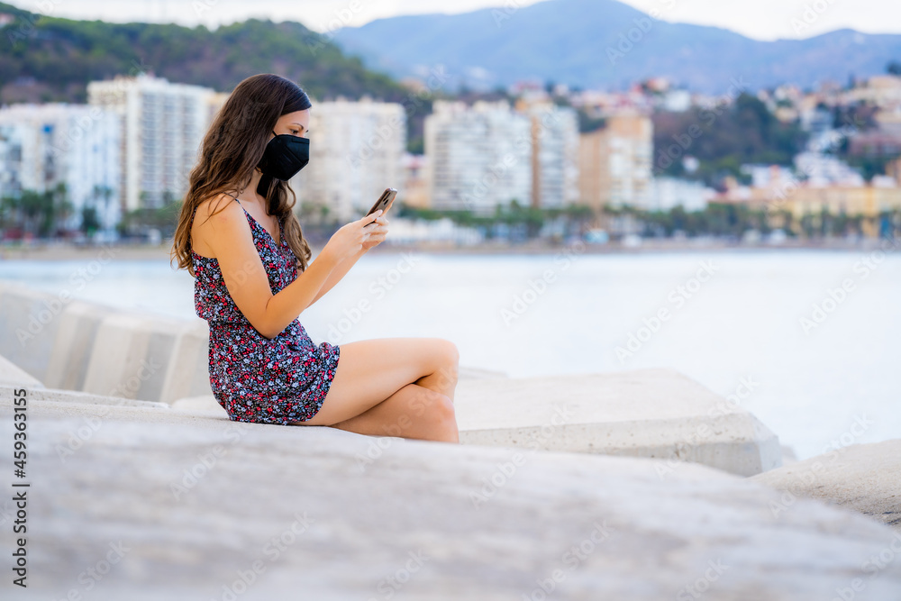 Fototapeta premium beautiful woman looking the smart phone