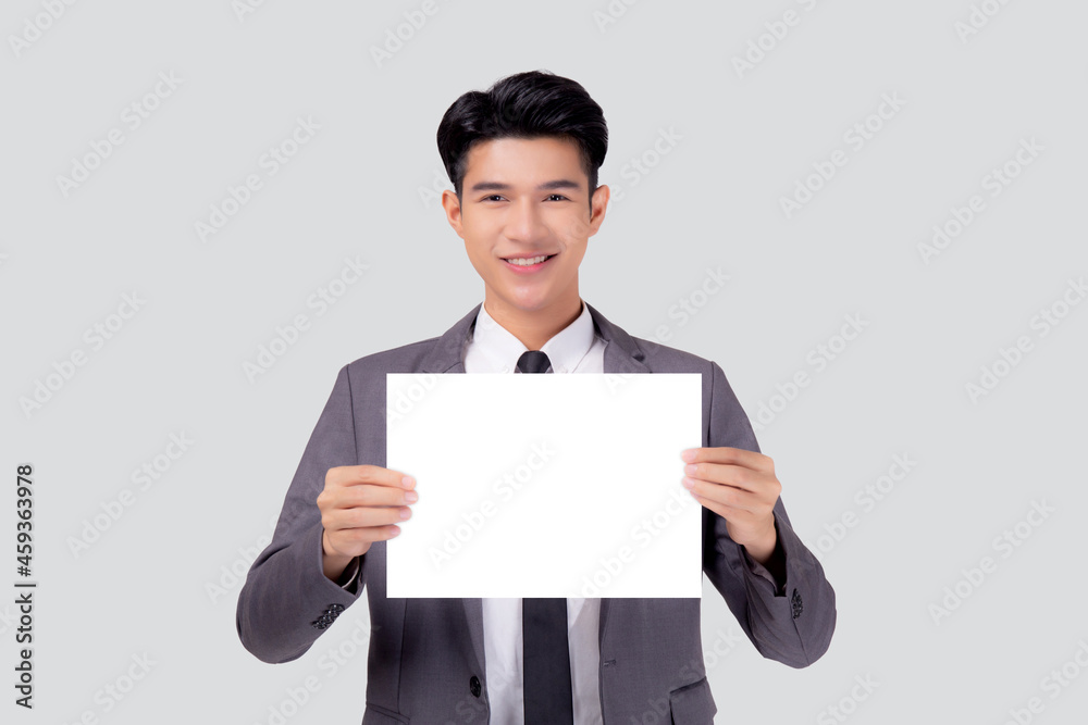 Young asian business man showing empty signboard for advertising isolated on white background, businessman confident holding billboard banner for presenting with copy space, success and achievement. Young asian business man showing empty signboard for advertising isolated on white background, businessman confident holding billboard banner for presenting with copy space, success and achievement.