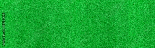 Panorama of New Green Artificial Turf Flooring texture and background seamless