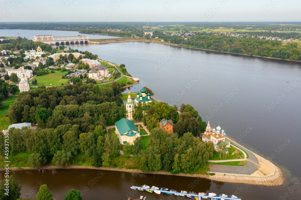Fototapeta premium Scenic aerial view of Uglich townscape on banks of Volga river overlooking Kremlin Cathedrals on cloudy summer day, Yaroslavl region, Russia