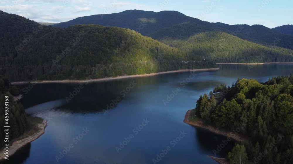 Beautiful aerial shot of Lake Vidraru and Fagaras Mountains in Romania Beautiful aerial shot of Lake Vidraru and Fagaras Mountains in Romania