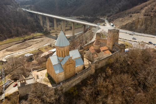 Aerial view of the medieval fortess of of Ananuri, located between the Zhinvali reservoir and the Georgian Military..Road photo