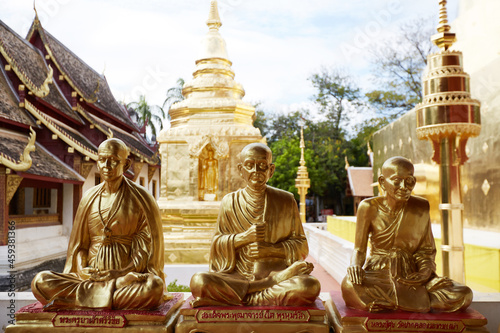 Stone statue of Buddha, outside the temple. Chiang Mai, Thailand © lichaoshu