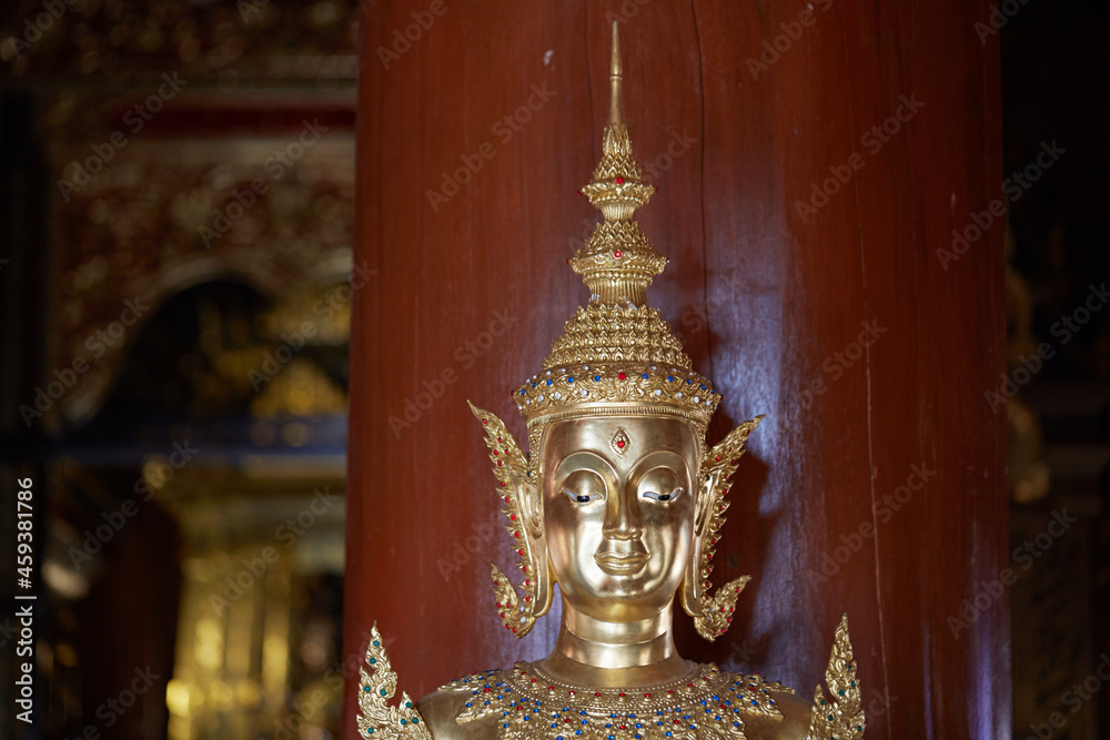 Golden Buddha statues, inside the temple. Chiang Mai, Thailand