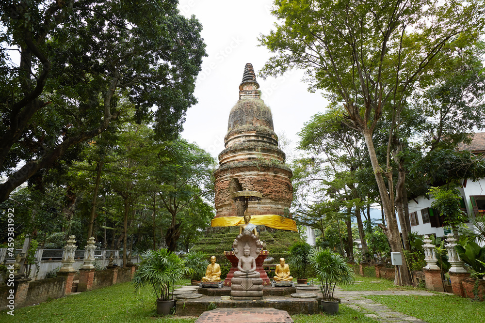 Ancient Buddha statue, closeup. In a quiet and comfortable natural environment Ancient Buddha statue, closeup. In a quiet and comfortable natural environment
