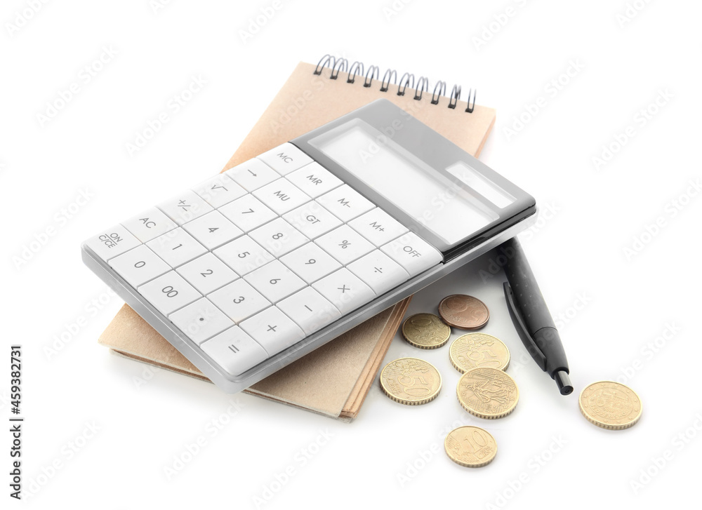 Coins with calculator and notebook on white background Coins with calculator and notebook on white background