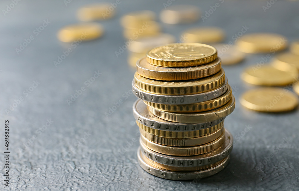 Golden coins on dark background Golden coins on dark background