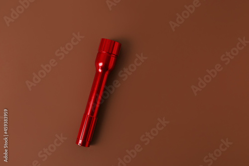 Modern flashlight on color ...