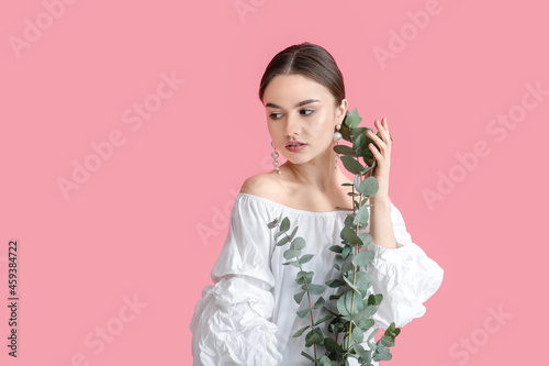 Beautiful young woman with ...
