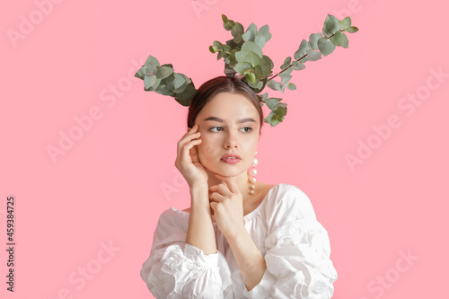 Beautiful young woman with ...