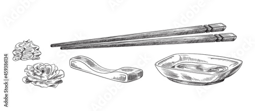 Japanese style setting for sushi from sticks, stand, ginger, gravy boat