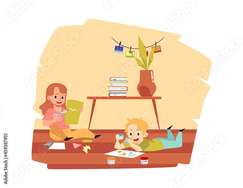 Happy children spending leisure making crafts in kindergarten or art class.