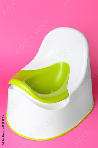 Potty on color background. Toilet training concept