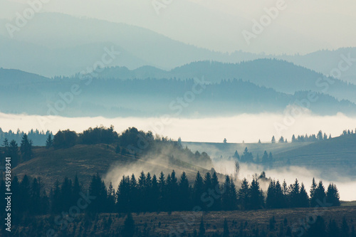 mountain landscape on a foggy morning. beautiful autumnal nature scenery © Pellinni