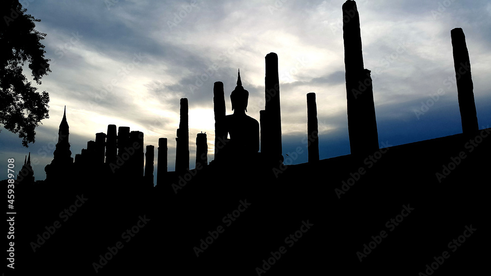 Silhouette of the historical park in Thailand at dusk.