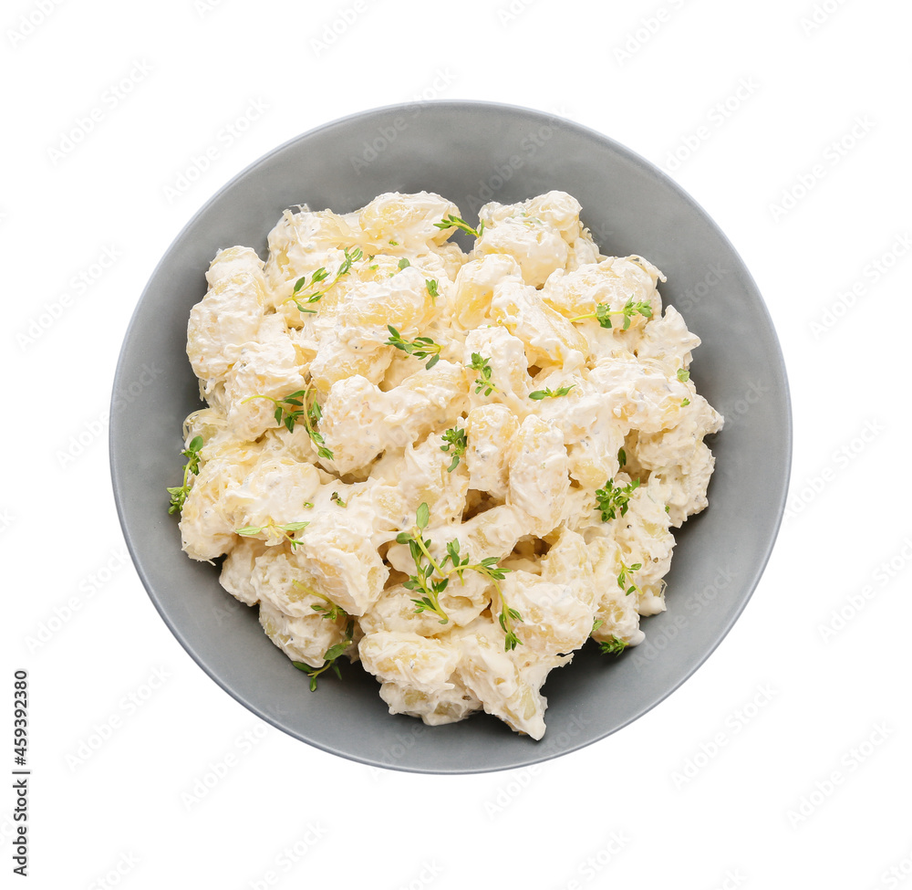 Bowl of delicious gnocchi with creamy sauce on white background Bowl of delicious gnocchi with creamy sauce on white background