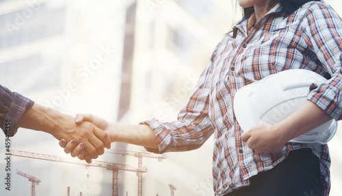 team of construction engineers are working together at the site.