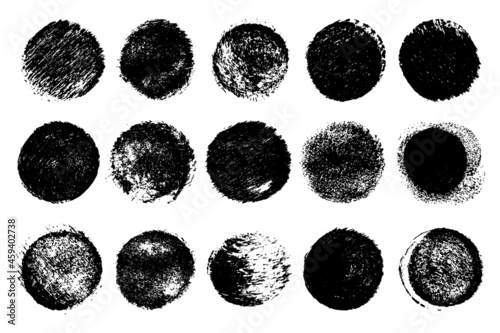 Set of black grunge texture round shape isolated on white background. Grainy textured design elements. Vector illustration, eps 10.