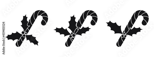 Holly berry with candy cane. Set of black christmas icons. Gift icon in flat design. Vector illustration.