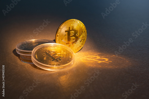 Cryptocurrency bitcoin the future coin. Bitcoin BTC Cryptocurrency Coins. Stock Market Concept. Cryptocurrency created, distributed, traded, and stored in decentralized ledgersystem known blockchain. photo