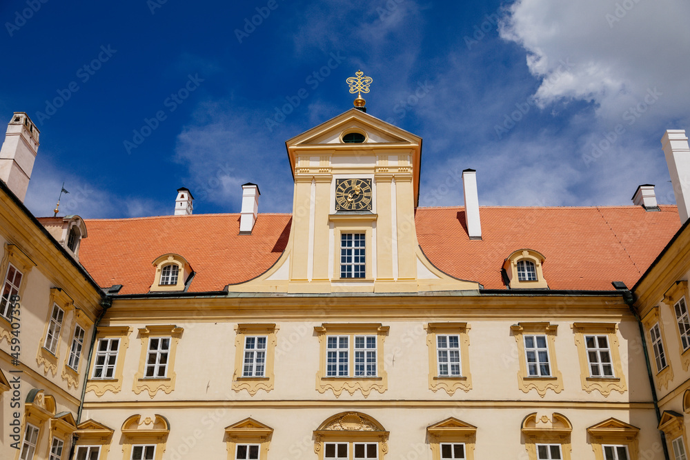 Valtice castle, Southern Moravia, Czech Republic, 04 July 2021: Baroque old historic residences, popular travel destination at sunny summer day, UNESCO world heritage, Sculptures in ornamental garden