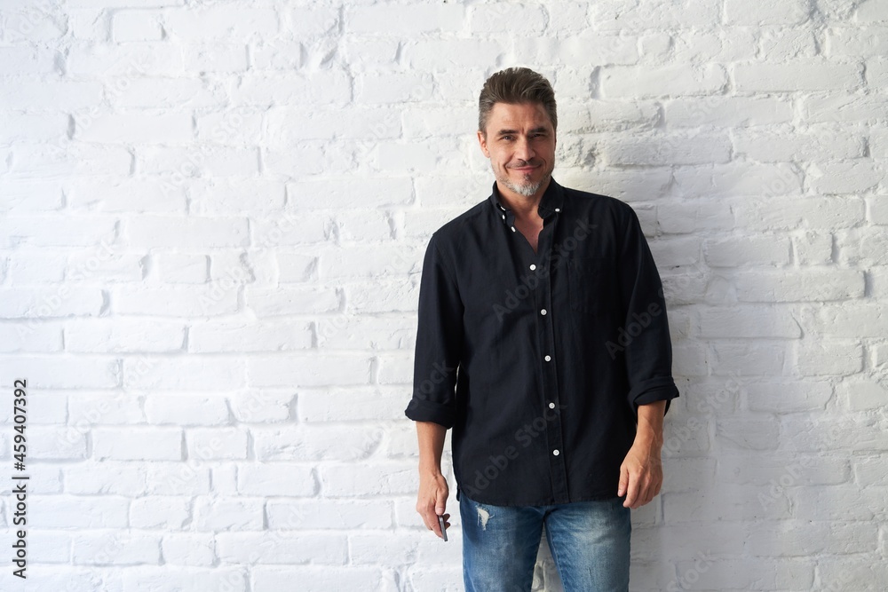 Portrait of a good looking happy older white man smiling. Copy space for text. Portrait of a good looking happy older white man smiling. Copy space for text.