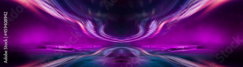 Light effect, blurred background. Wet asphalt, night view of the city, neon reflections on the concrete floor. Night empty stage, studio. Dark abstract background, dark empty street. Night city.