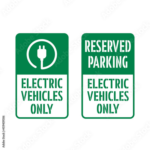 Reserved Parking, Electric Vehicles Only sign.