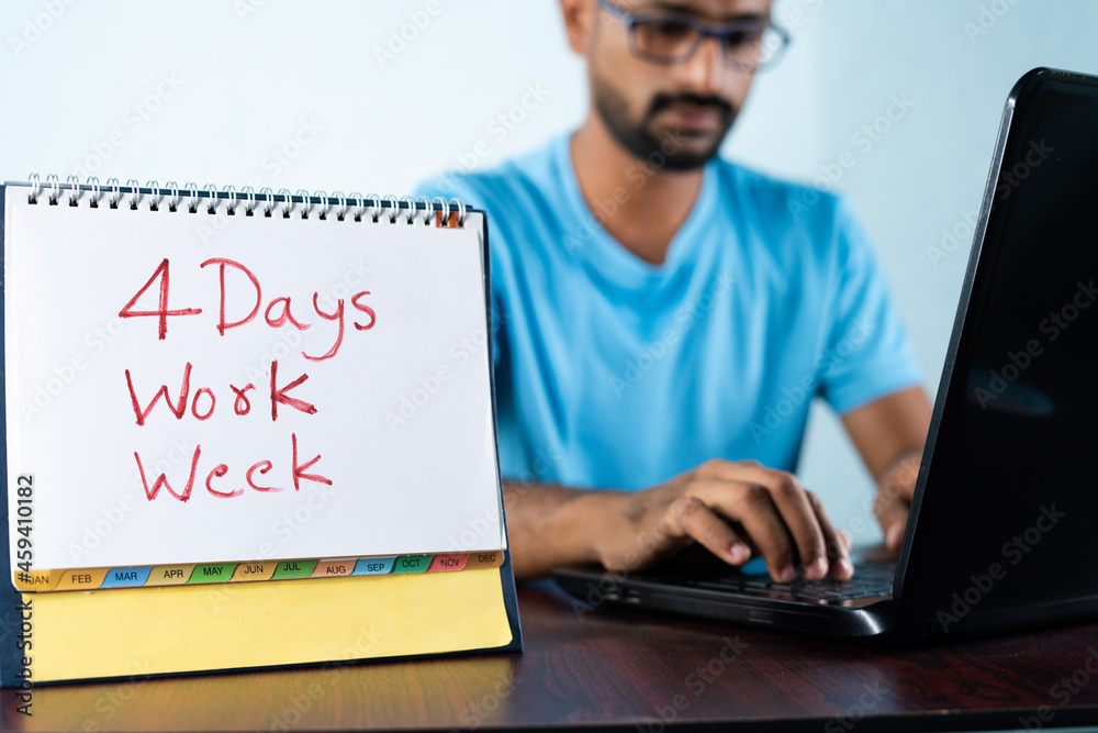focus on calender, Concept of four or 4 days work week showing by young man working in background and shows calendar. - obrazy, fototapety, plakaty 