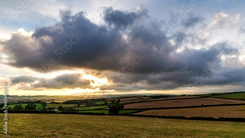 Wallpaper Mural Sunset over the fields in Time Lapse Movie, Berry Pomeroy Village in Devon, England, Europe Torontodigital.ca