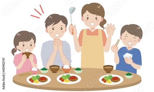 家族においしい手料理をふるまうお母さん