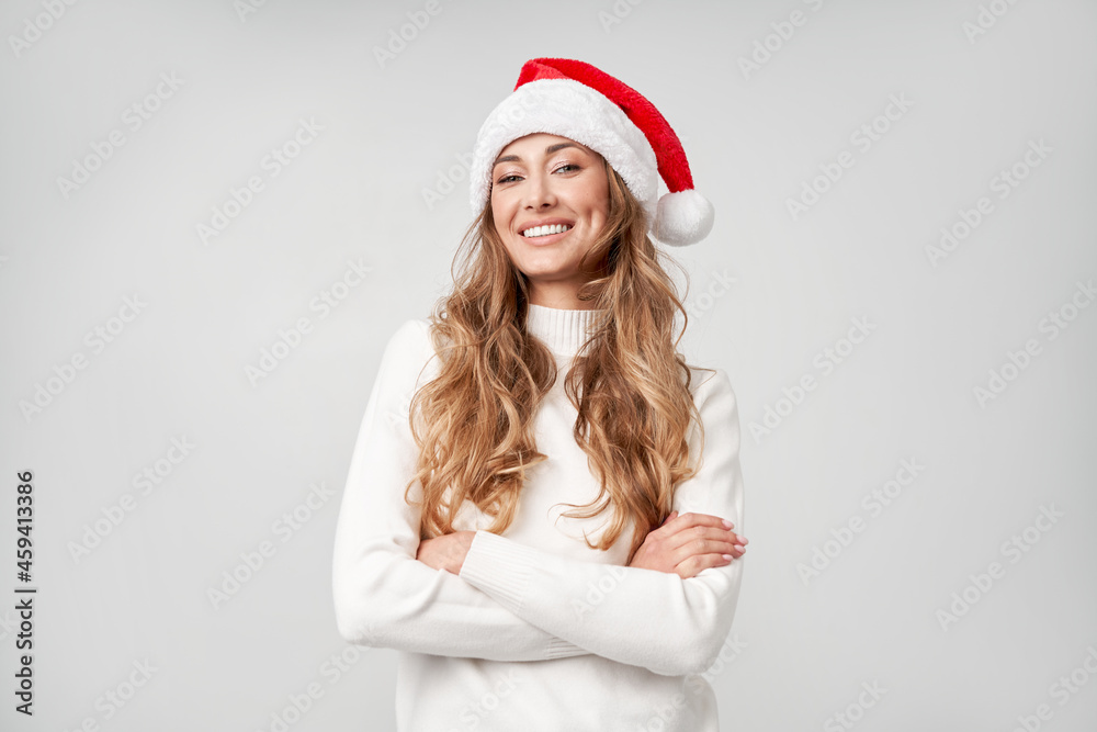 Woman christmas Santa Hat sweater white studio background Woman christmas Santa Hat sweater white studio background