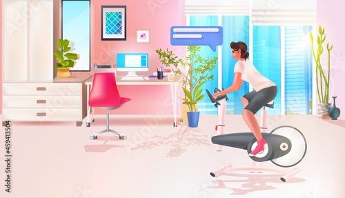 woman with chat bubble riding stationery bike healthy lifestyle chat bubble communication concept