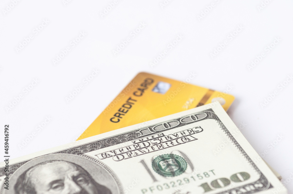 US 100 dollar bank note with credit card, financial banking conception. Exchange marketing payment. US 100 dollar bank note with credit card, financial banking conception. Exchange marketing payment.