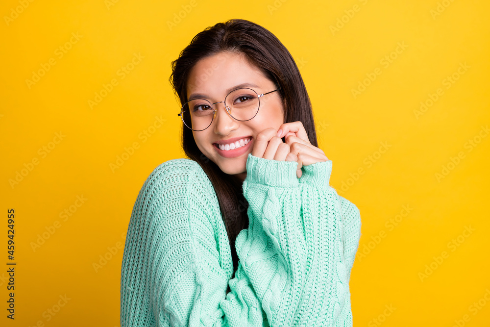 Photo of charming cheerful young woman smile good mood wear glasses isolated on yellow color background Photo of charming cheerful young woman smile good mood wear glasses isolated on yellow color background