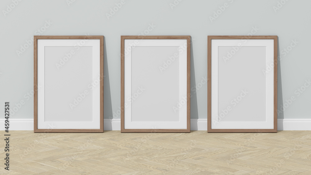 Three wooden frames on wooden floor with a white wall. Empty interior. 3D render vertical wooden frame mock up. Oak parquet. 3D illustrations. 3D design interior. Triptych. Passe partout frame. Three wooden frames on wooden floor with a white wall. Empty interior. 3D render vertical wooden frame mock up. Oak parquet. 3D illustrations. 3D design interior. Triptych. Passe partout frame.